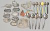 Sterling silver lot with nine liquor bottle tags, six enameled handled spoons, figural spoon, etc.