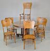 Round oak Victorian table and six oak chairs. ht. 30 in., dia. 48