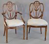 Set of twelve Federal mahogany style dining chairs with plaque marked Paramount Antiques N.Y. includes two armchairs and ten side ch...