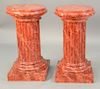 Pair of faux marble pedestals. ht. 30 1/2 in., top dia. 16 in.