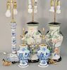 Five table lamps to include a pair of Oriental style lamps, pair of blue and white delft vases made into lamps, and a blue and white...