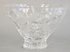 Large Lalique crystal bowl having scrolling vine and frosted bird design, marked on foot: Lalique France (chip on interior rim). 
he...