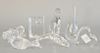Eight piece Baccarat crystal group to include three paperweights, duck, lion, cat, dolphin, and a vase. tallest ht. 7 in.