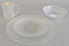 Sixty-four piece Glcoloc glass dinner set to include 16 plates, 16 luncheon plates, 16 bowls, and 16 cups.