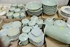 Group of celadon porcelain in six trays including 16 bowls, cups, fish plates, etc.