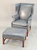 Southwood blue leather Chippendale style wing chair. ht. 43 in.