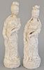 Two standing Geisha or Guanyin figures, white glazed and blanc de chine (one with repaired neck). ht. 10 in., 10 1/4 in.