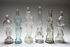 Figural Colorless Glass Bottles Group of 6