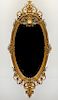 OVAL MIRROR WITH GILTWOOD ROCOCO STYLE FRAME