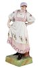 A RUSSIAN PORCELAIN FIGURE OF A DANCING PEASANT WOMAN, GARDNER PORCELAIN FACTORY, MOSCOW, LATE 19TH CENTURY
