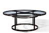 A Waldo Designs custom iron circular dining table