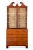 A George III inlaid satinwood secretary bookcase