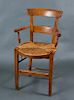 A French Provincial Fruitwood Rush Seat Armchair