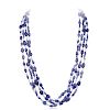 A Tanzanite and Baroque Pearl Long Strand Necklace