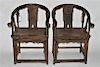 Pair of Carved Saddleback Chinese Chairs