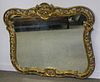 Carved and Giltwood Floral Decorated Mirror.