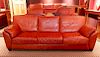 Red Leather Upholstered Over-Stuffed Three-Cushion Sofa