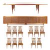 Comedor. Siglo XX. En talla de madera. Con aplicaciones de bejuco. Consta de: mesa, 11 sillas y trinchador.