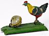 Tin animated chicken cracking egg penny toy