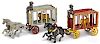 Two cast iron horse drawn Royal Circus cage wagons