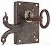 Wrought iron and brass door lock, early 19th c., with its original key, plate - 5 1/2'' x 3 1/2''.