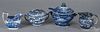 Four pieces of historical blue Staffordshire, 19th c., to include two creamers, a covered sugar