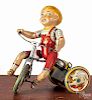 Unique Art tin litho wind-up Kiddy Cyclist, 8 1/2'' h.