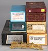 Seven brass HO scale train cars and locomotives