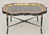 Regency style tray top low table, shaped oblong top raised on ring turned legs joined by a stretcher. ht. 19 in., top: 29" x 38" Pro...