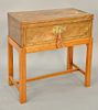 Mahogany lap desk on stand with brass inlays (slight brass inlay lifting). ht. 21 in., top: 10 1/2" x 20"  Provenance: An Estate fro...