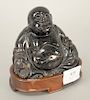 Hardstone seated Buddha, China 20th century, with custom-fitted wooden base. ht. 4 in. Provenance: Estate of Kenneth Jay Lane