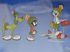 Four Warner Brothers cels including Chuck Jones "Meter Leader" 460/500, "Special Delivery from Mars" sericel, and two "Duck Dodgers ...