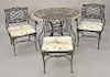 Mosaic tile outdoor table and three outdoor armchairs. ht. 29 in., dia. 42 in. Provenance: From the Estate of Deborah G. Black of Gr...
