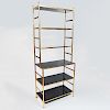 Brass and Black Lacquer Six Tier Etagere, in the Manner of Billy Baldwin 