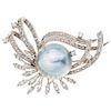 A half pearl dand diamond palladium silver brooch.