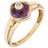 An amethyst and diamond 14K yellow gold ring.