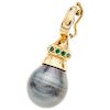 A cultured pearl and emerald 18K yellow gold pendant.