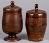 Two carved and turned wood tobacco containers