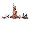 A Bronze angel on a marble mount and four small cast bronze figures.