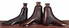 Three Rockingham type boot bottles, ca. 1900, two - 6 1/2'' h. and one - 6'' h.