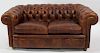 Fine Quality Vintage Leather Chesterfield Settee.