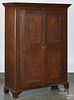 Pennsylvania cherry canning cupboard, 19th c., with a red wash, 60'' h., 46'' w., 14 1/2'' d.