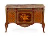 A Transitional Style Gilt Bronze Mounted Marquetry Commode