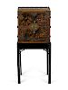 A Chinese Export Lacquered Cabinet on Stand
