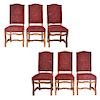 Lote de 6 sillas. Francia. Siglo XX. En talla de madera de roble. Con respaldos semiabiertos y asientos en tapicería color rojo.
