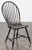 New England Windsor hoopback chair, early 19th c., retaining a black painted surface