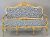 French Louis XV style settee with gilt carved frame and blue upholstery. ht. 44 in., wd. 62 in.