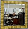 Contemporary modern square framed mirror with brass inlaid frame and beveled glass mirror. 40" x 40"