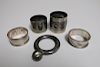 4 Silver Napkin Rings and a Tiffany & Co Rattle