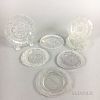 Seven Sandwich Colorless Pressed Glass Cup Plates